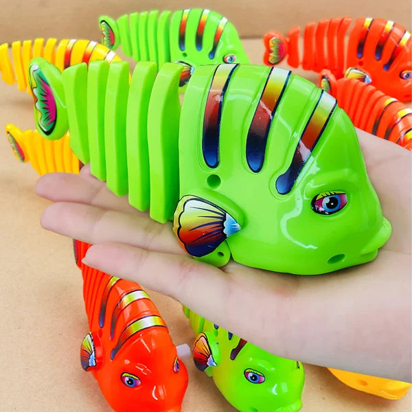 Jouets de poissons en plastique à remonter et à secouer